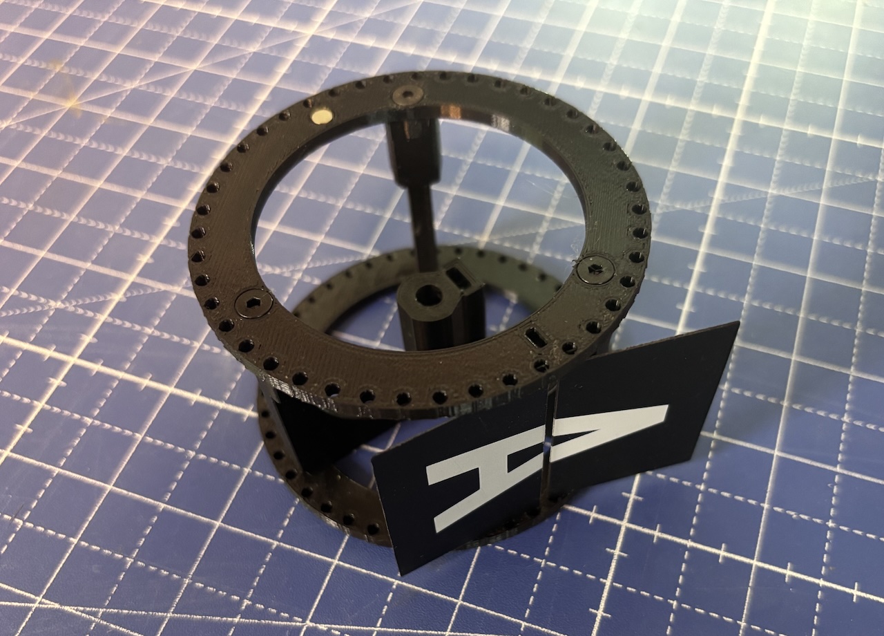 Image of the main drum with two flaps installed, showing the intended alignment between the flaps and the drum.