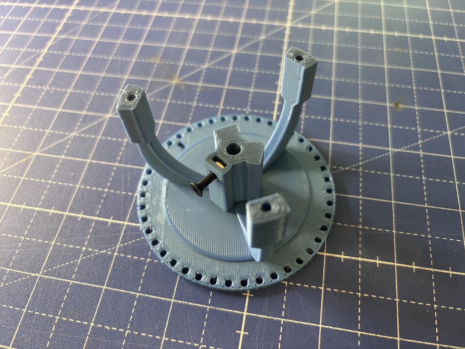 Image of the main drum with the nut and set screw shown.