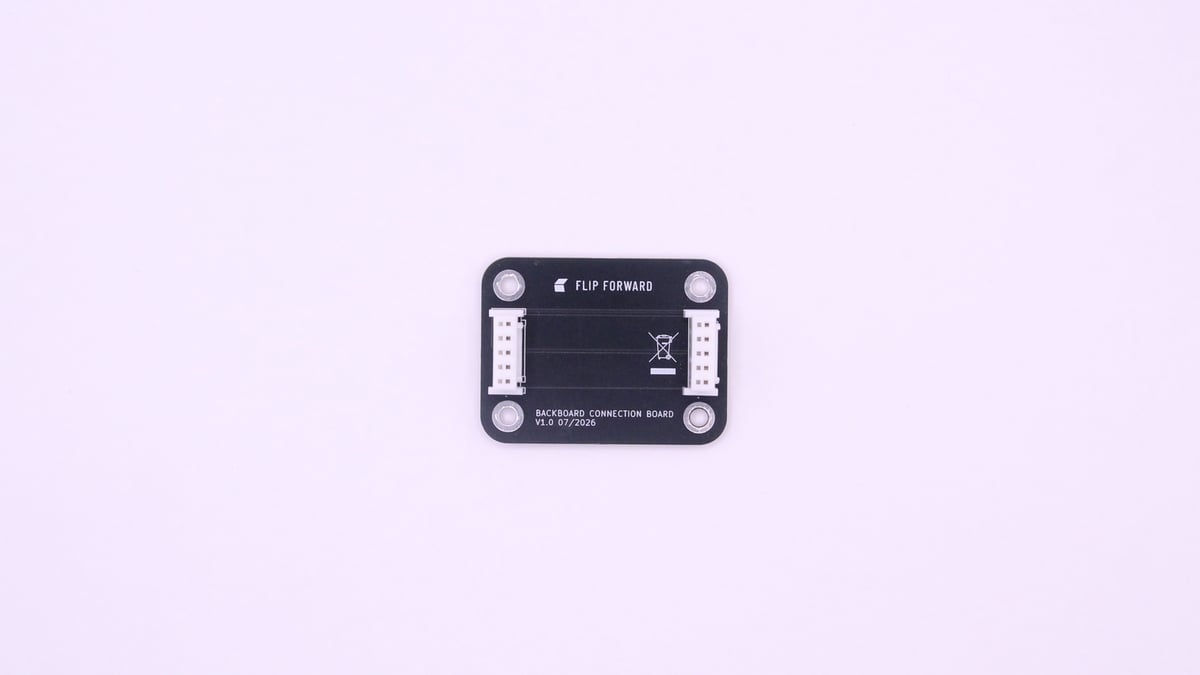 The flip forward backboard connection board, a small black PCB with two 5-pin JST-XH sockets and traces running straight across between them.